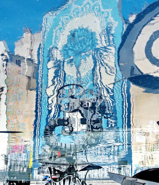 Shepard Fairey : knowledge + action = pouvoir   – le reflet dans la fontaine Stravinsky